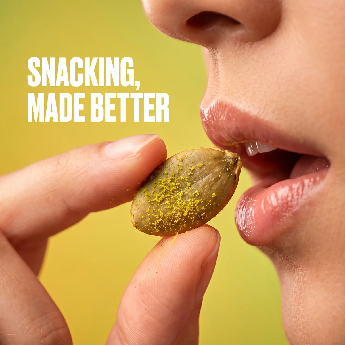 Woman eating a flavoured roasted pumpkin seed - healthy oil-free snacking